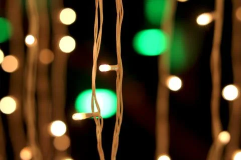 Bunch of small lights hanging on string Stock Photos