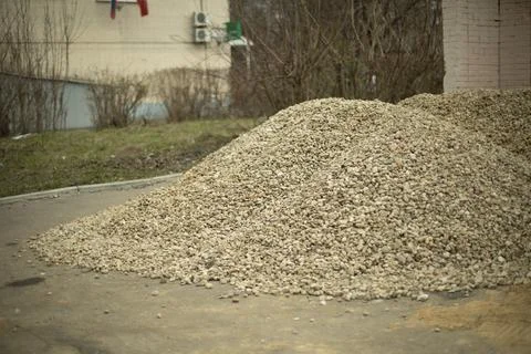 Bunch of small stone on construction site. Building stone for road. Stock Photos