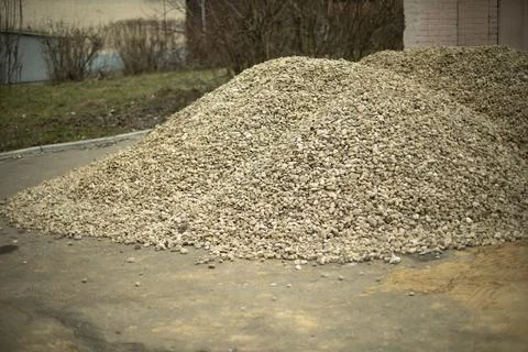 Bunch of small stone on construction site. Building stone for road. Stock Photos