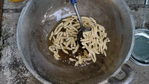 A bunch of snay in a frying pan Stock Footage 278275473