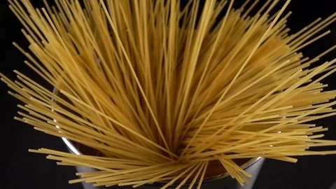 Bunch of spaghetti falls in a pot Stock Footage 71102054