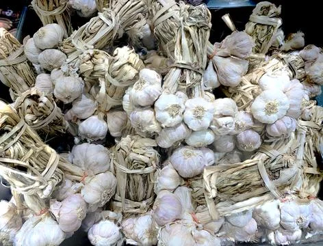 A bunch stack of white garlic bulb in the food marketplace, Bangkok, Thailand Stock Photos