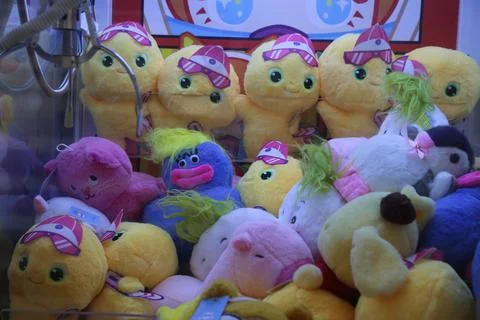 A bunch of stuffed animals are in a machine Stock Photos