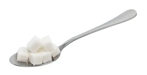 A bunch of sugar cubes on a white background. Sugar isolate Stock Photos