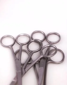 Bunch of surgical scissors on a white background. Stock Photos