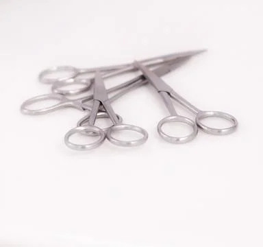 Bunch of surgical scissors on a white background. Stock Photos