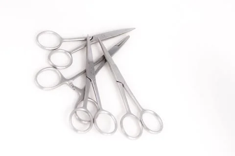 Bunch of surgical scissors on a white background . Foto stock