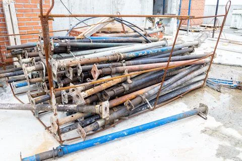 A bunch of telescopic rack-jack for mounting the formwork of a monolithic Stock Photos
