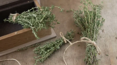 A bunch of thyme on a wooden table. Stock Footage 82634690