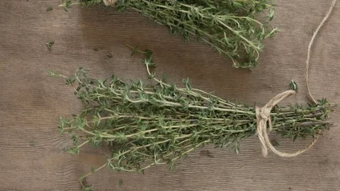 A bunch of thyme on a wooden table. Stock Footage 83093903