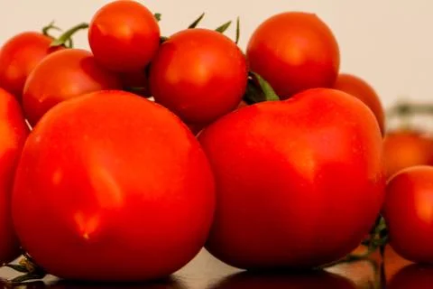 The bunch of tomatoes Stock Photos