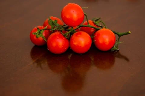 The bunch of tomatoes Stock Photos