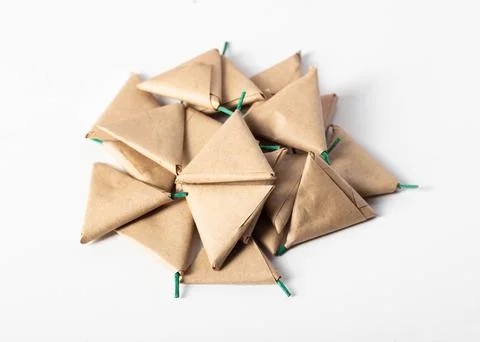 A bunch of triangle firecrackers on the table. The danger of pyrotechnics, close Stock Photos