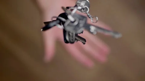 Bunch of various keys tossed upwards in slow motion. Stock Footage 202290096