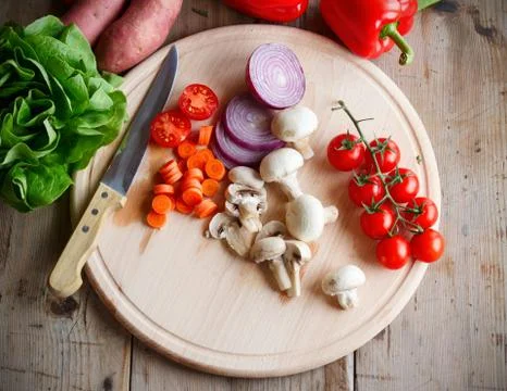Bunch of vegetables on cutting board Stock Photos