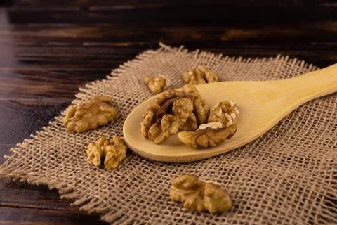 A bunch of walnuts in a spoon Stock Photos