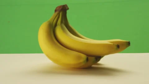 Bunch of yellow bananas on greenscreen Stock Footage 146363735
