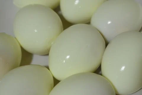 Bunches of boiled eggs in Easter day special in closeup view.A kitchen photog Stock Photos