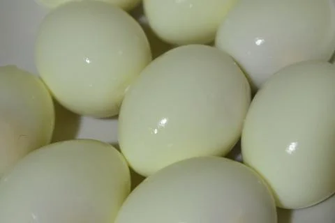 Bunches of boiled eggs in Easter day special in closeup view.A kitchen photog Stock Photos
