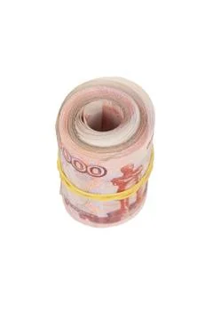 Bundle of banknotes puffed up in a straw and wrapped with an elastic band Stock Photos