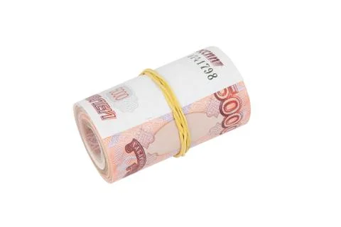 Bundle of banknotes puffed up in a straw and wrapped with an elastic band Stock Photos