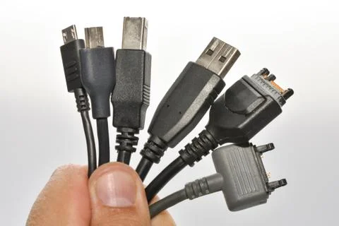 A bundle of cables with different connectors, for connecting computer equipme Stockfoto's