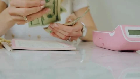 A bundle of dollar bills in female hands. Counting savings, salaries and in.. Stock Footage 266471089