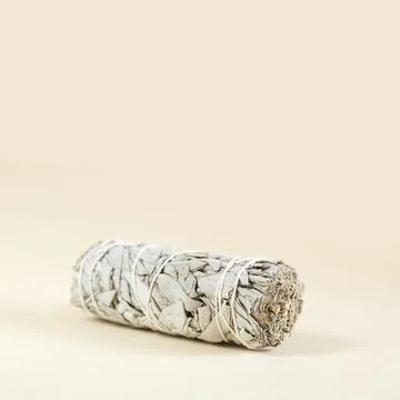 Bundle of dry white sage close-up. Product for purification, meditation and h Stock Photos