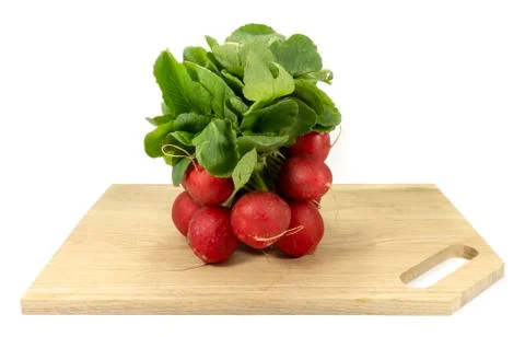 Bundle of fresh red radish with green leaves Foto stock