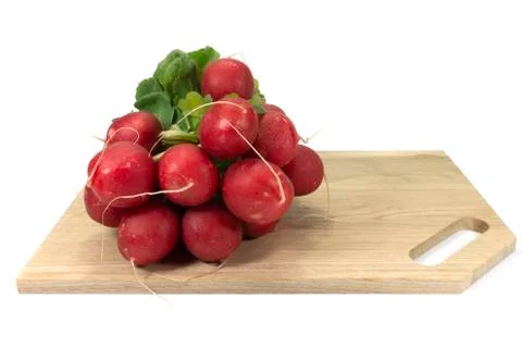 Bundle of fresh red radish with green leaves Stock Photos