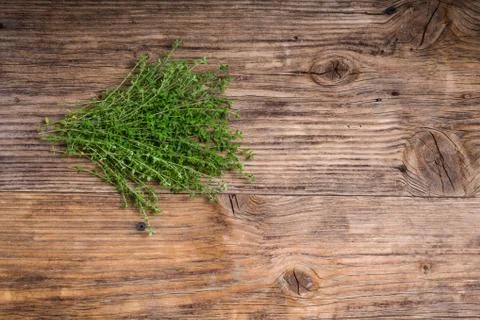 Bundle of fresh thyme on a table 스톡 사진