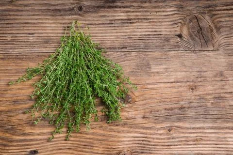 Bundle of fresh thyme on a table Stock Photos
