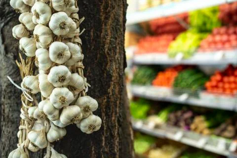 Bundle garlic hung on hang Stock Photos