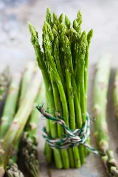 A bundle of green asparagus Stock Photos