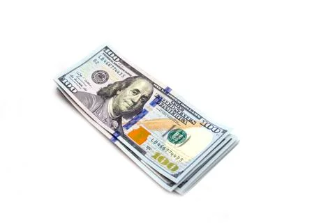 A bundle of hundred-dollar bills on a white background. Copy space. Stock Photos