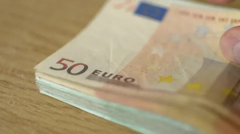 A bundle of money on the table selective focus Vídeo Stock 10849925