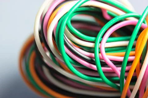 A bundle of multicolored electrical, car, computer, telephone twisted wires. Foto stock