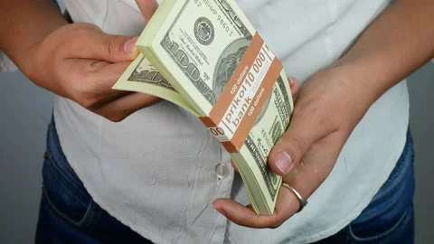 Bundle of one hundred dollar bills Stock-Footage 234129395