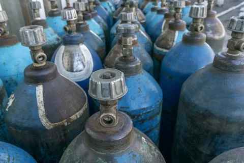 A bundle of oxygen cylinders with compressed gas Stock Photos