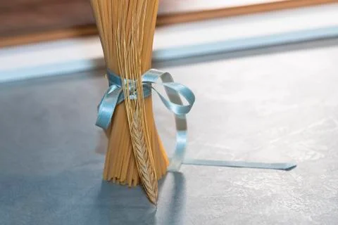 Bundle of pasta standing on a table Stock Photos