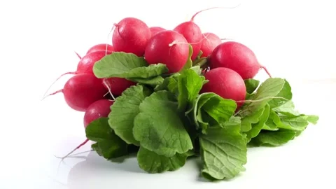 Bundle of Radish rotating on white background Stock Footage 277793299
