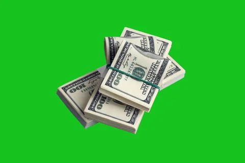 Bundle of US dollar bills isolated on chroma keyer green. Pack of american mo Stock Photos