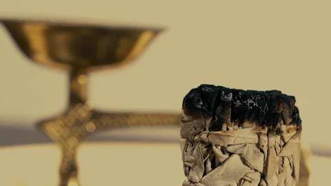 Bundle of White Sage, traditional Native American incense with Golden burning di Stock Footage 145886438