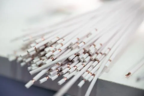 A bundle of white stripped electrical copper wires. Stock Photos