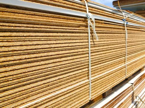 Bundle of wood chipboards. Stock Photos