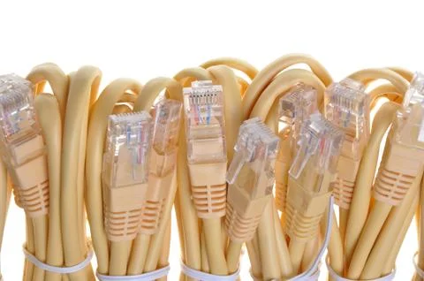 Bundle yellow network cable to the office network Stock Photos