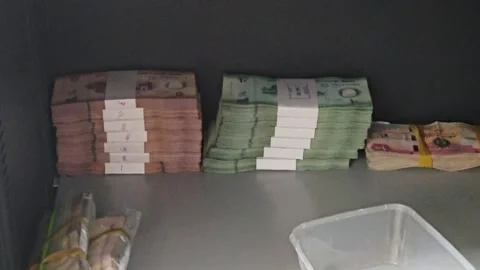 Bundled stacks of uae dirham cash in various denominations Stock Footage 332773166