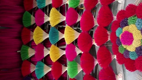 Bundles of multi-colored bamboo sticks for incense making in Vietnam 스톡 동영상 248406013