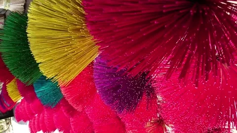Bundles of multi-colored bamboo sticks for incense making in Vietnam 스톡 동영상 248406015
