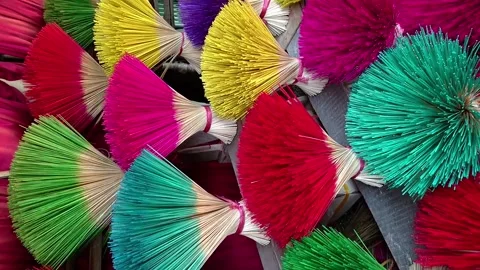 Bundles of multi-colored bamboo sticks for incense making in Vietnam 스톡 동영상 248406017
